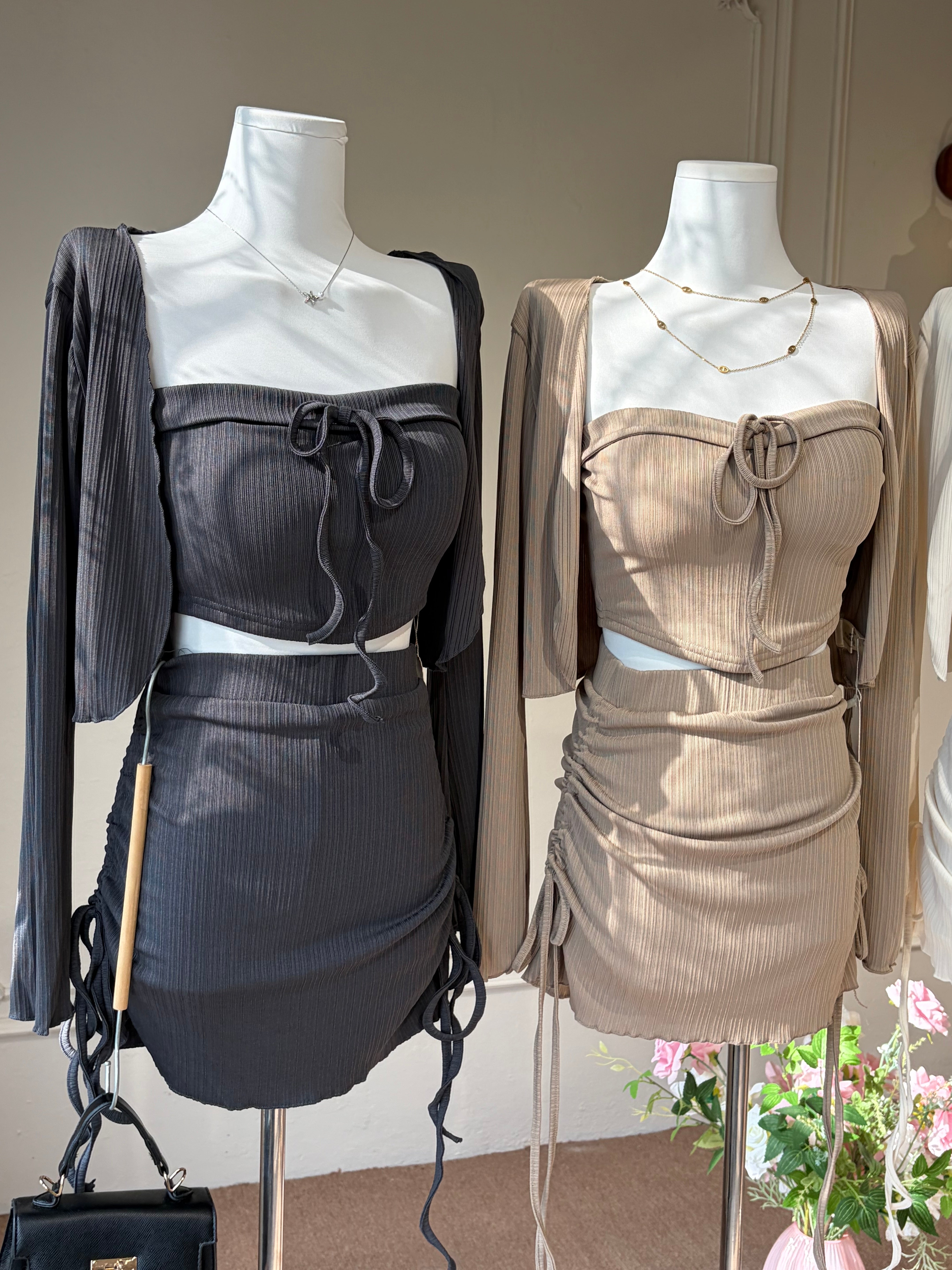 Charme.cc Women's Ribbed Tie Set - Cream, Brown and Black Color Variants with Cropped Top, Long Sleeve Shrug and Ruched Drawstring Mini Skirt
