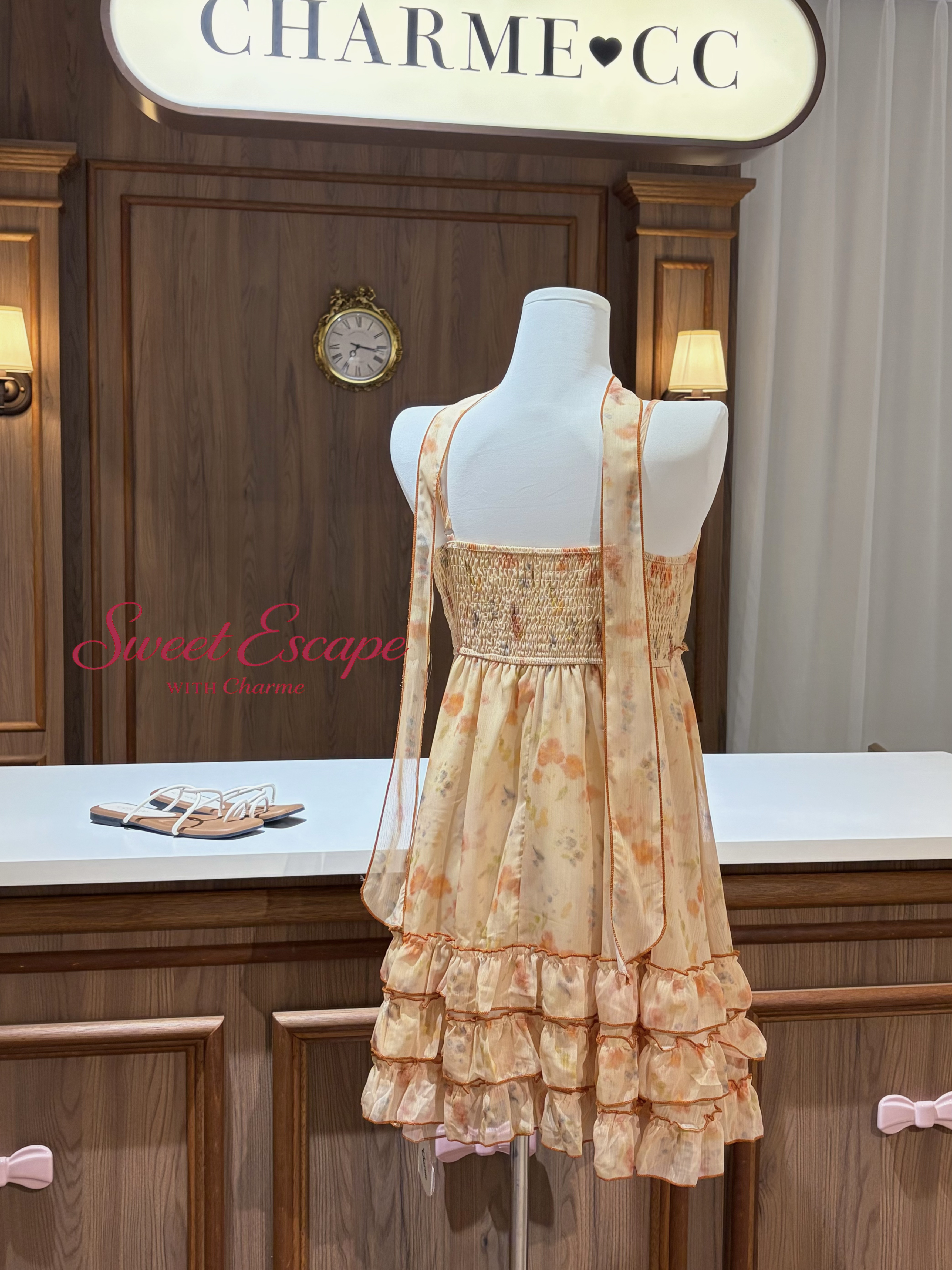 Floral chiffon spaghetti strap mini dress with layered ruffle hem in soft pastel print