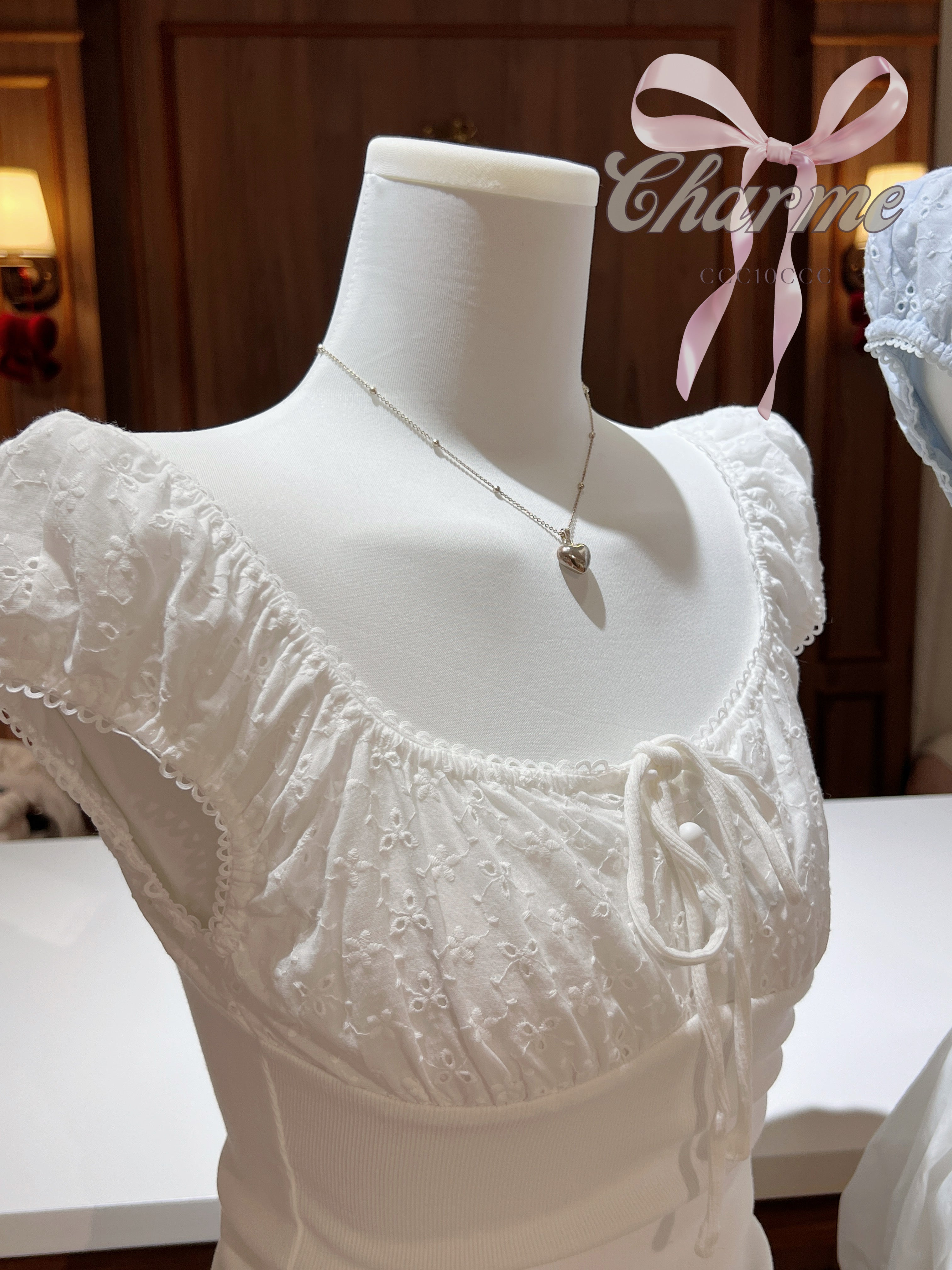 white feminine crochet top charme