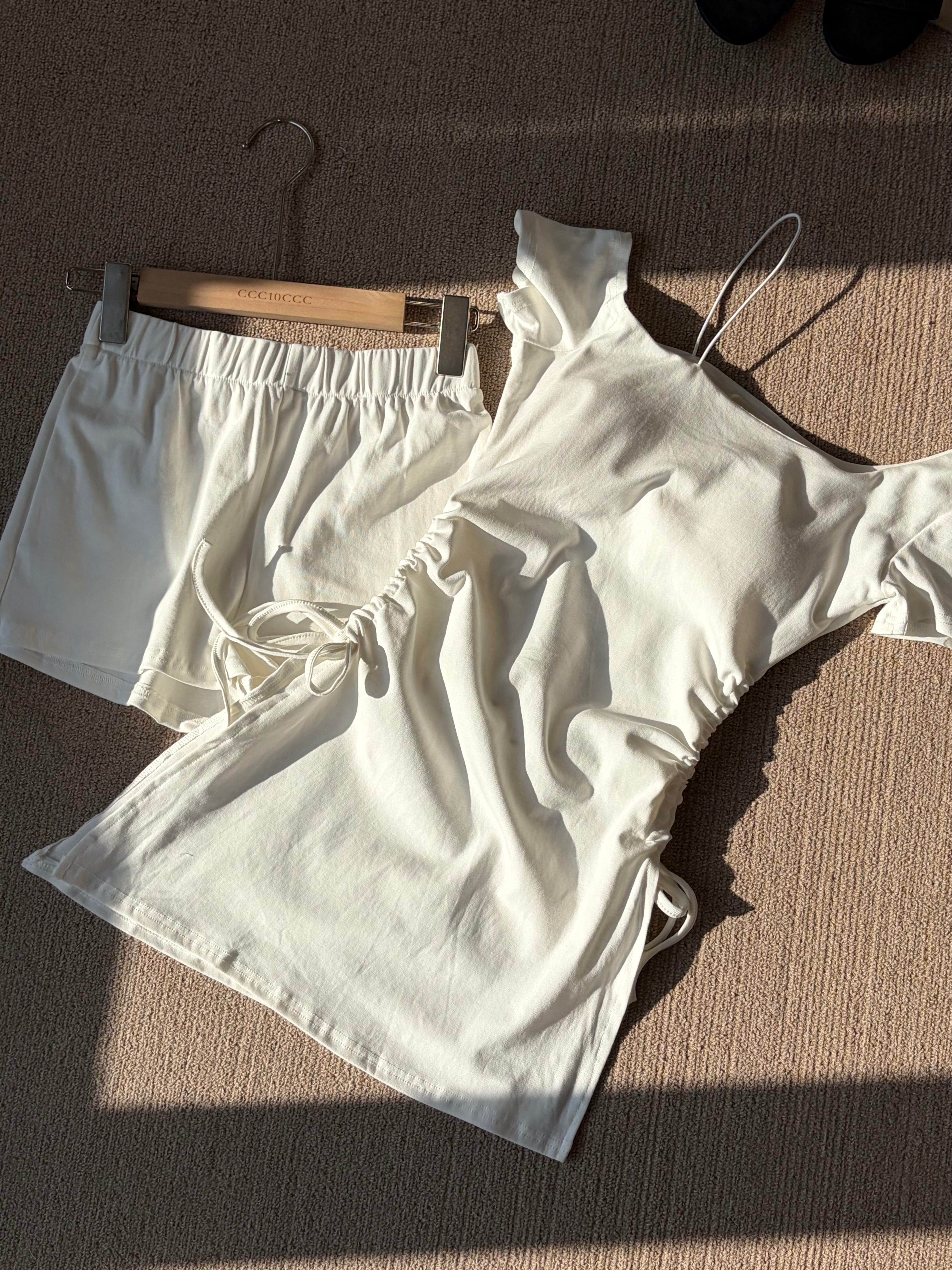 Charme.cc Women's white colour Asymmetrical Off-Shoulder Drawstring Top and Shorts Set