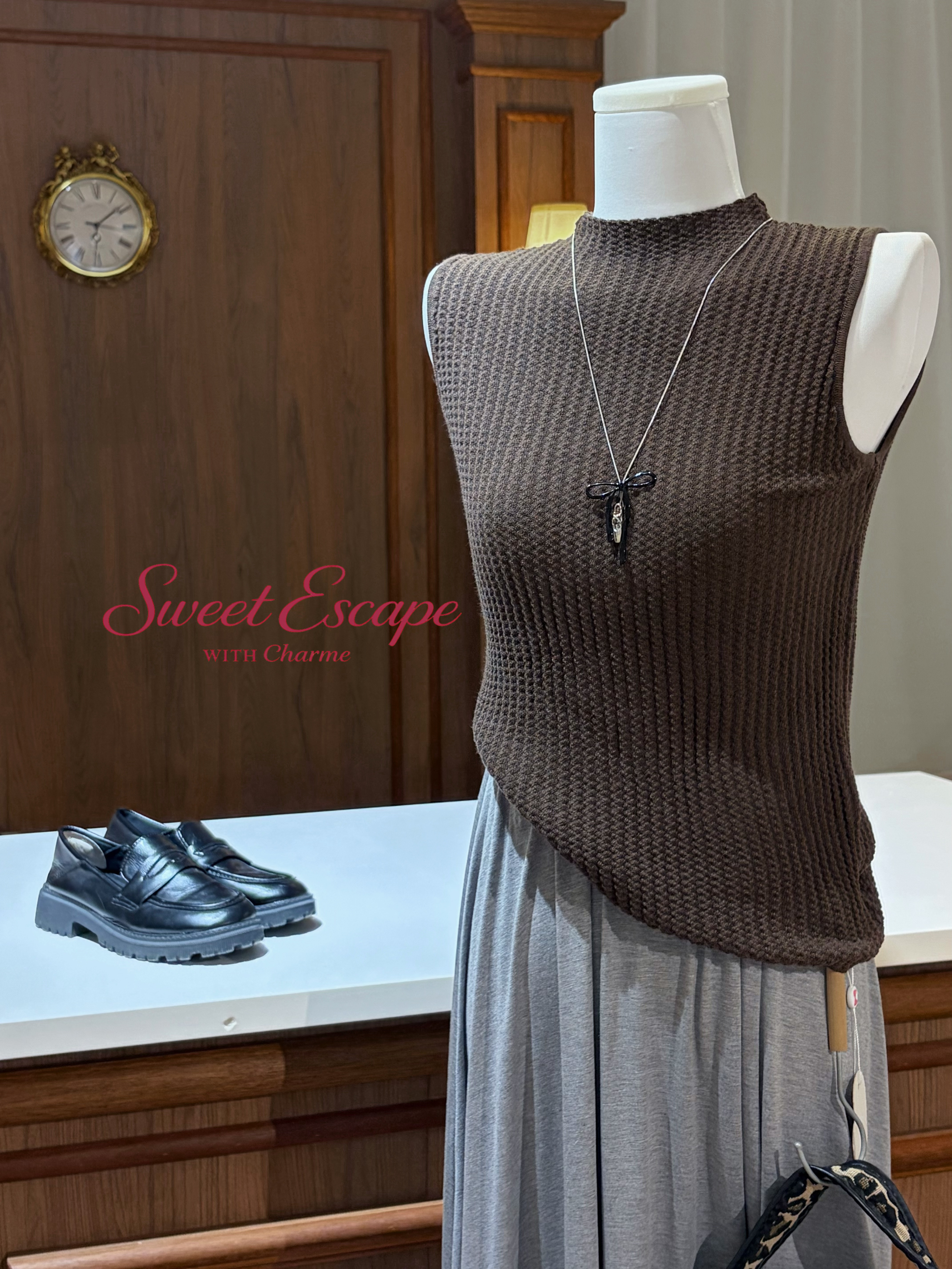 Close-up detail of textured knit sleeveless top with soft stretch fabric
