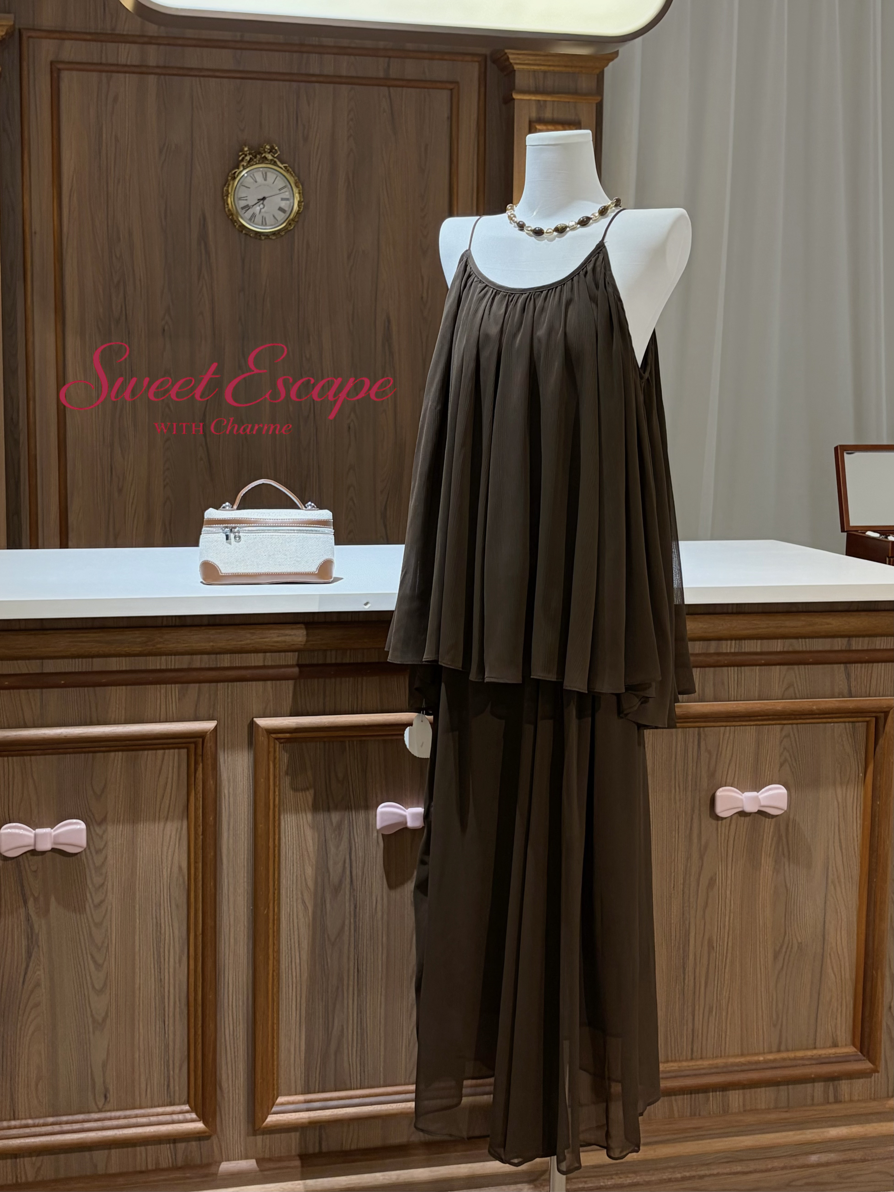 Close-up detail of draped cami top and matching relaxed fit pants set