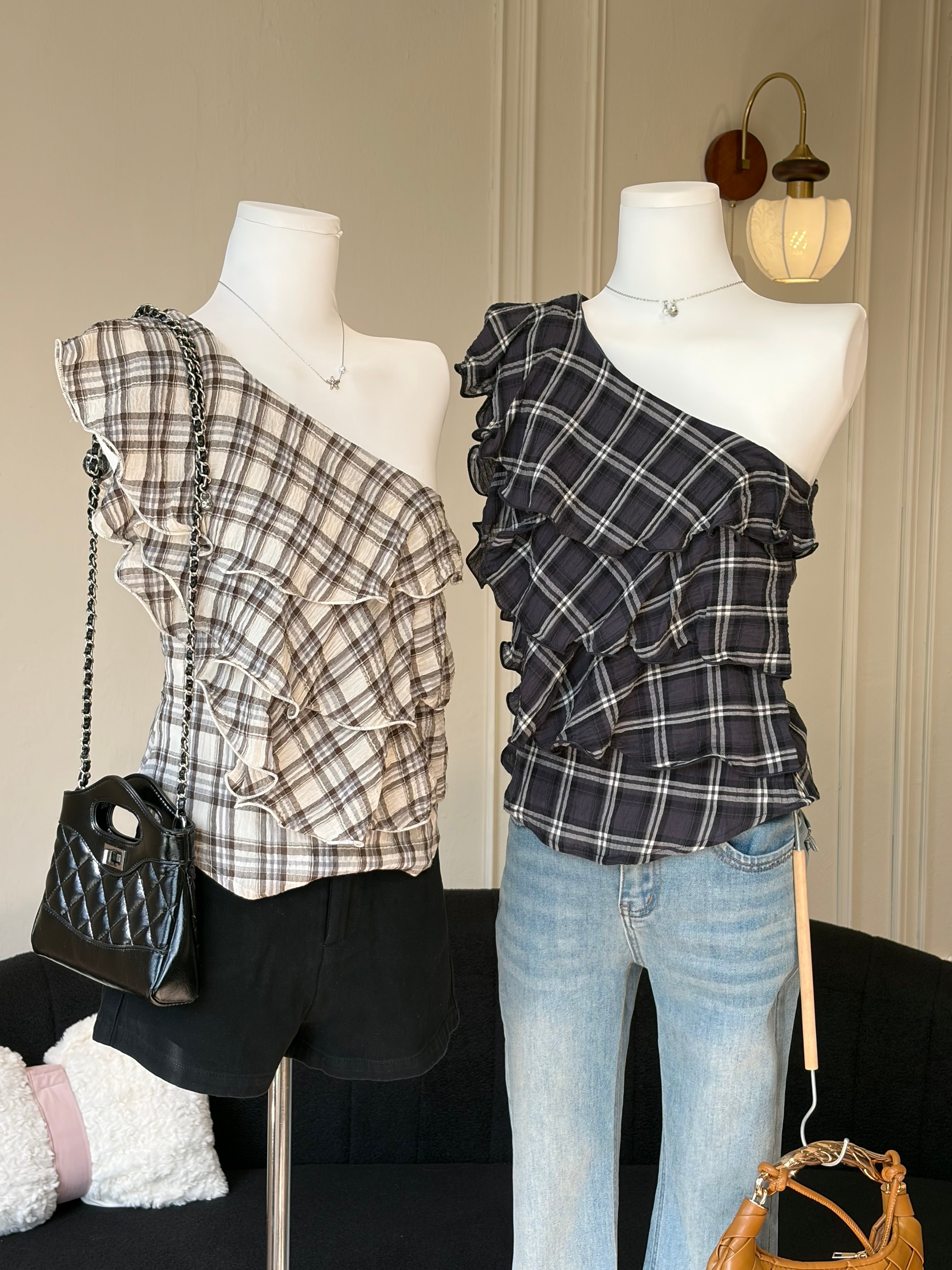 Charme.cc One-Shoulder Ruffle Top - Cream and Black Plaid Color Variants with Layered Ruffle Details