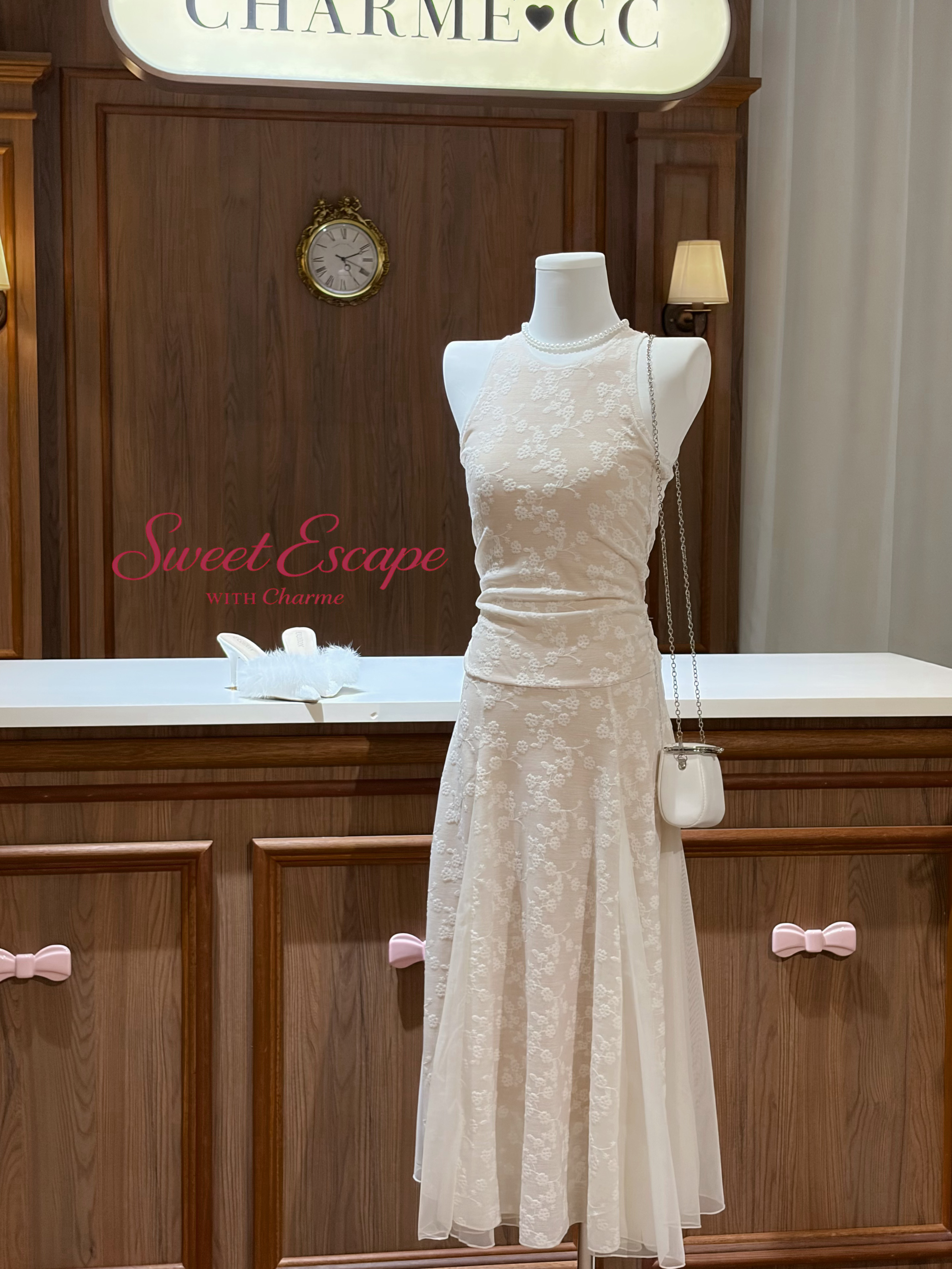 Cream floral lace maxi dress with elegant flowy silhouette